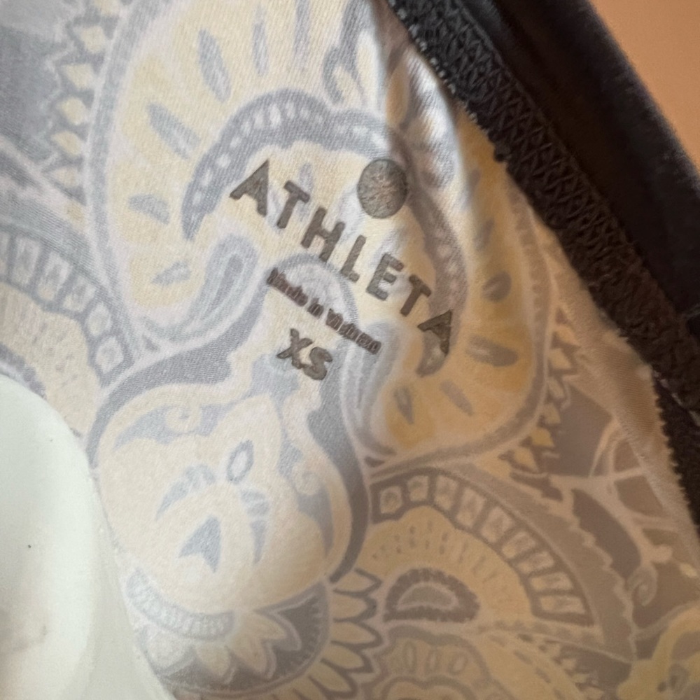 Like new Athleta yellow and gray paisley long sleeve athletic shirt
A14 - Picture 3 of 4